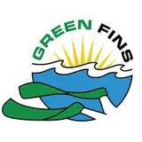 Circular logo showing yellow sun rays above blue stylized waves, green scuba fins in the foreground and the words "GREEN FINS" curved at the top