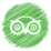 White stylized owl head with round glasses centered on a green circular background.